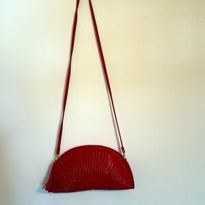 Rich Red Half-Moon Crossbody Bag with Radial Design